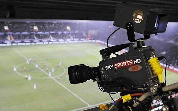 a tv camera at a football game