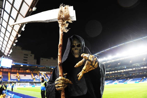 soccer fan in a grim reaper halloween costume
