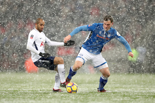 premier league action in the snow