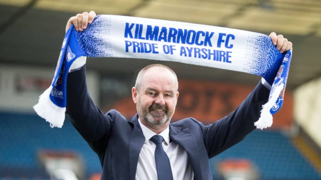 steve clarke holding a kilmarnock scarf