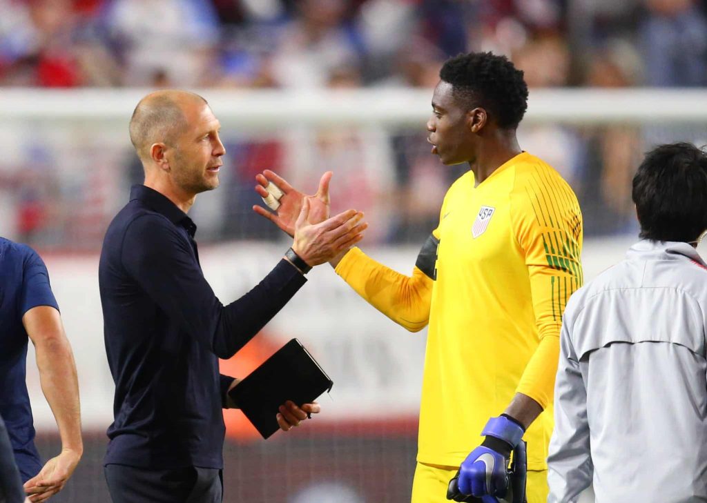 Gregg Berhalter congratulates his players