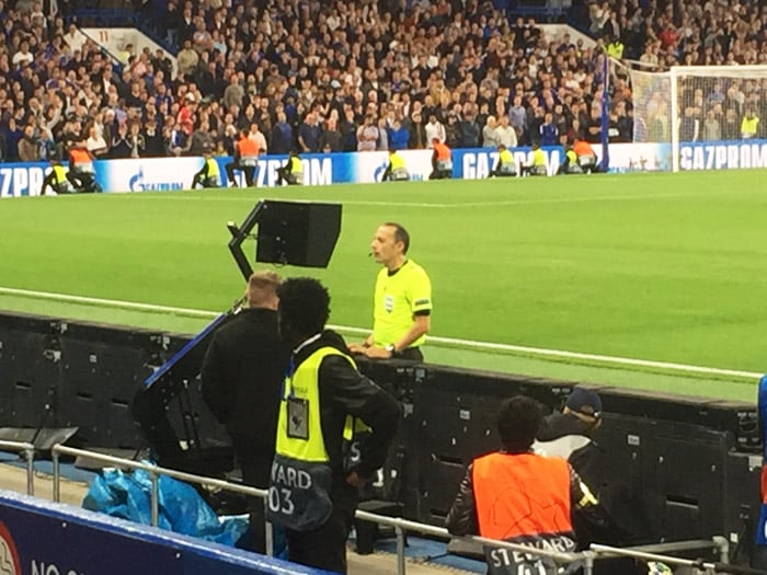 ref looks at VAR screen