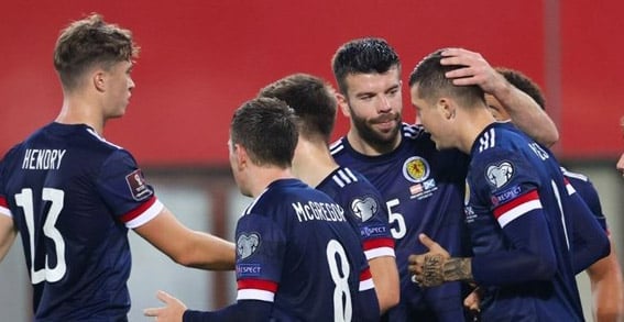 scotland players hug