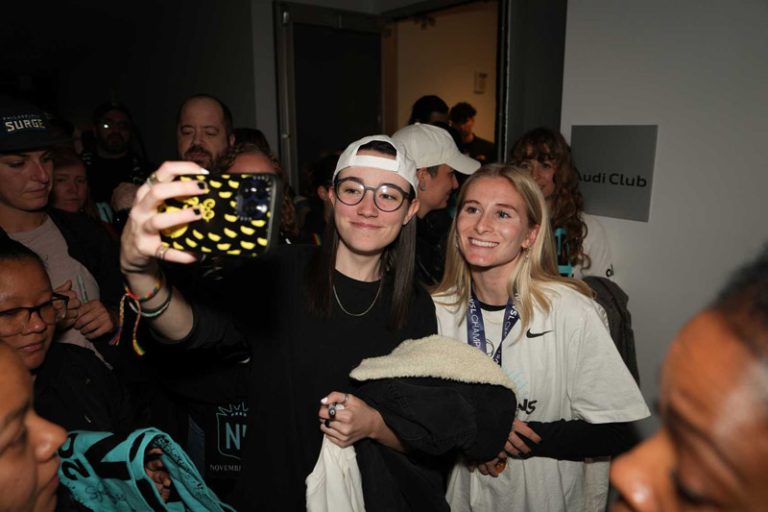 Jenna Nighswonger with fan. Photo by Gotham FC
