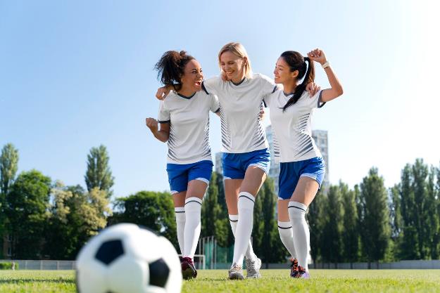 women playing soccer