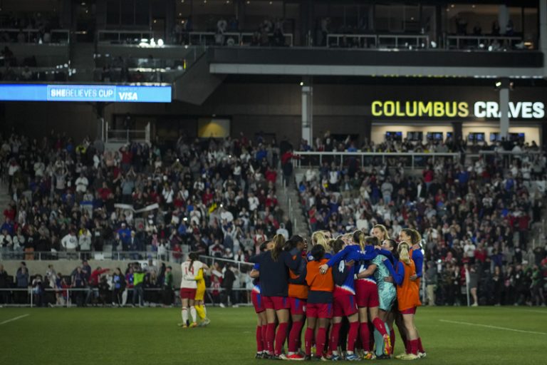 USWNT players celebrate winning shebelieves cup