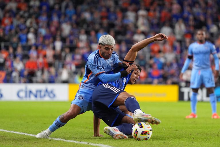 Nicholas Gioacchini and NYCFC midfielder Santiago Rodriguez