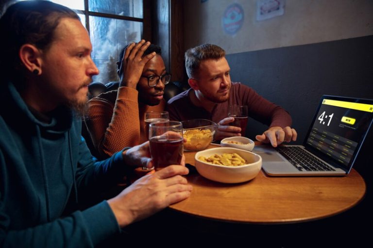 men watching streaming services on a laptop