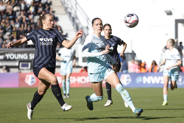 Washington Spirit defender Tara McKeown and NJ/NY Gotham FC forward Ella Stevens battle for the ball