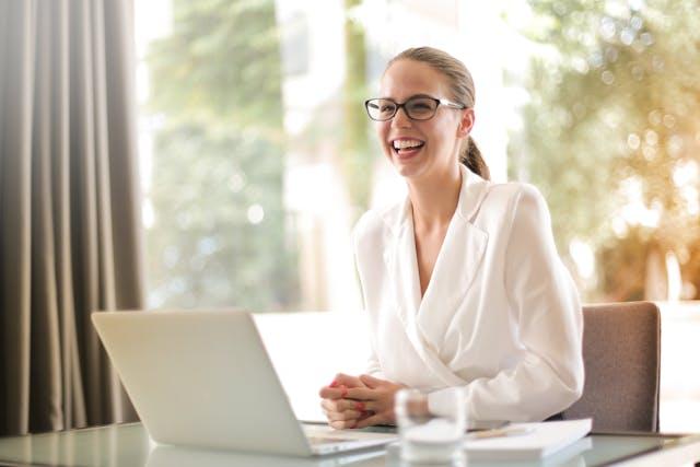 woman learning adobe express on a pc